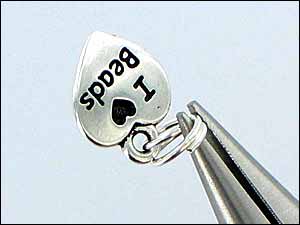 How to Open Split Rings with Pliers Step 3