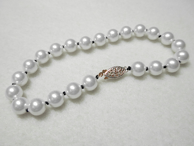 Knotting Pearls with a Clasp Step 20